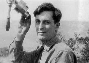 Theodore Dunham, Jr. with a piece of astronomical equipment.