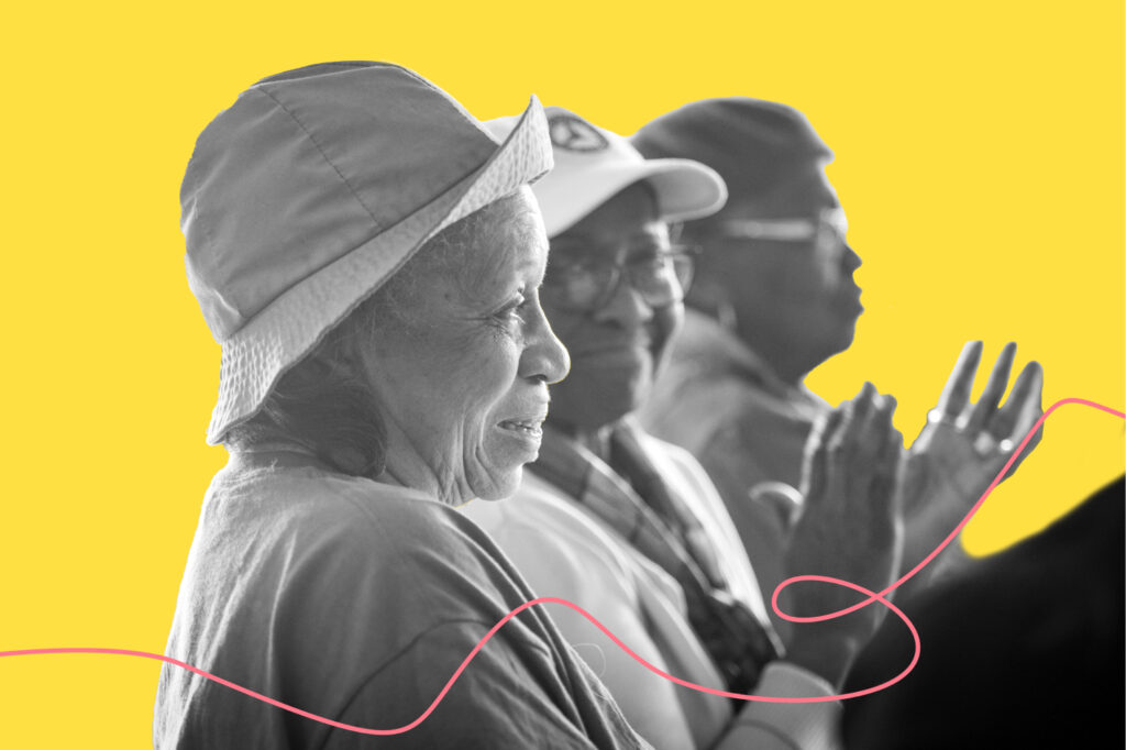 Older women sit in a peaceful sunlit room together