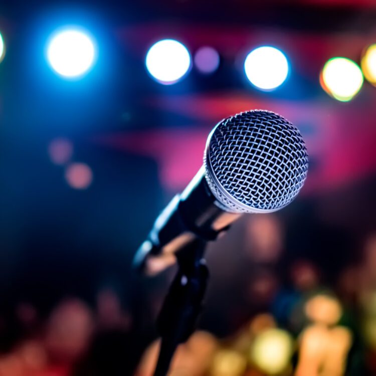 A close up of a microphone on stage