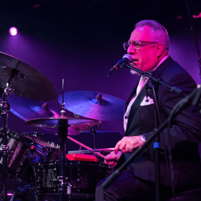Boby Sanabria playing the drums at our Bronx centennial event